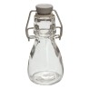 1 Bouteille en verre, H 9,5cm